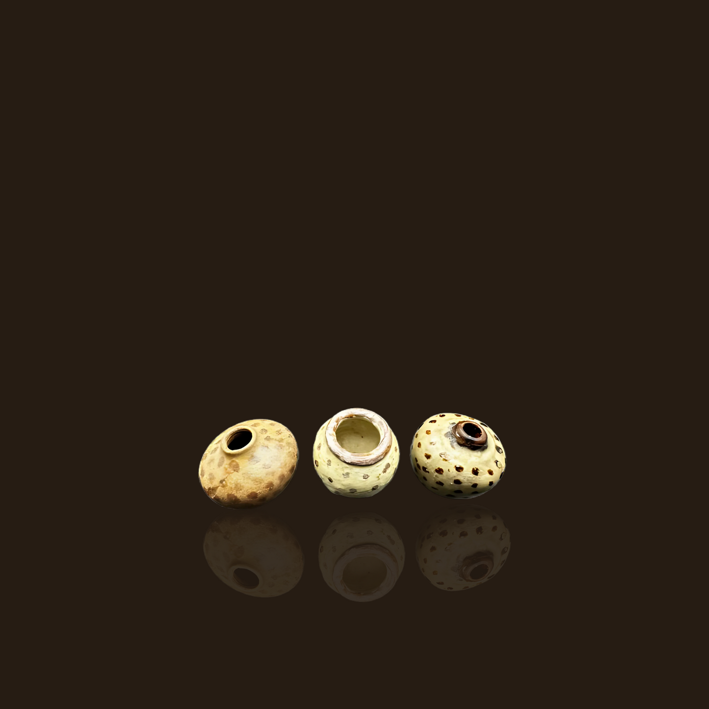 A Set of 3 Small Thai Brown Glazed Pots With Dots